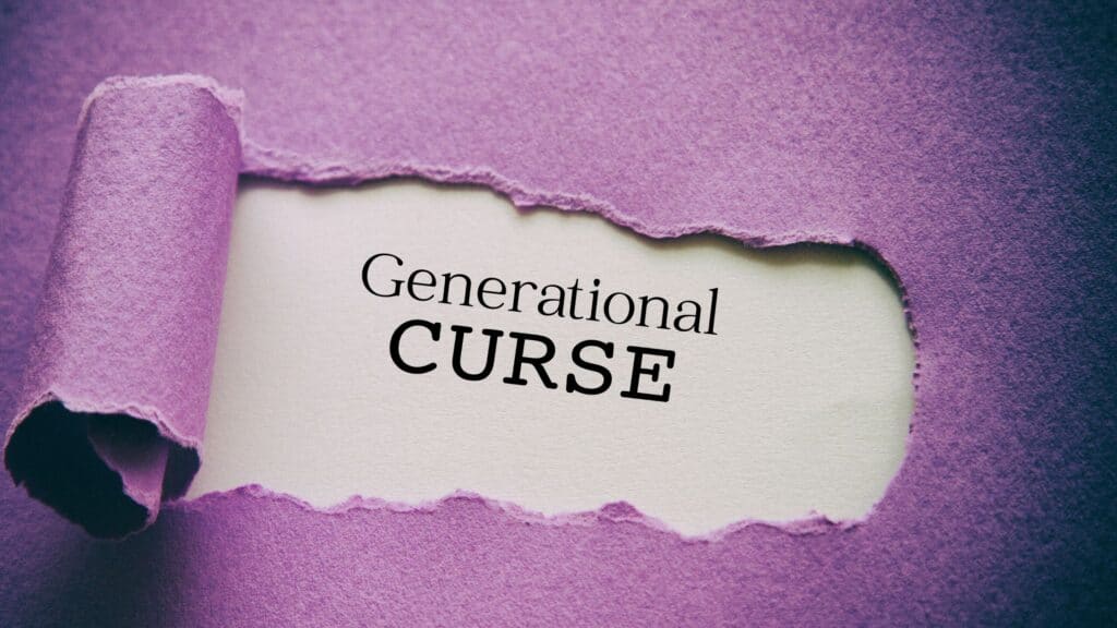The words generational curse written on torn piece of paper